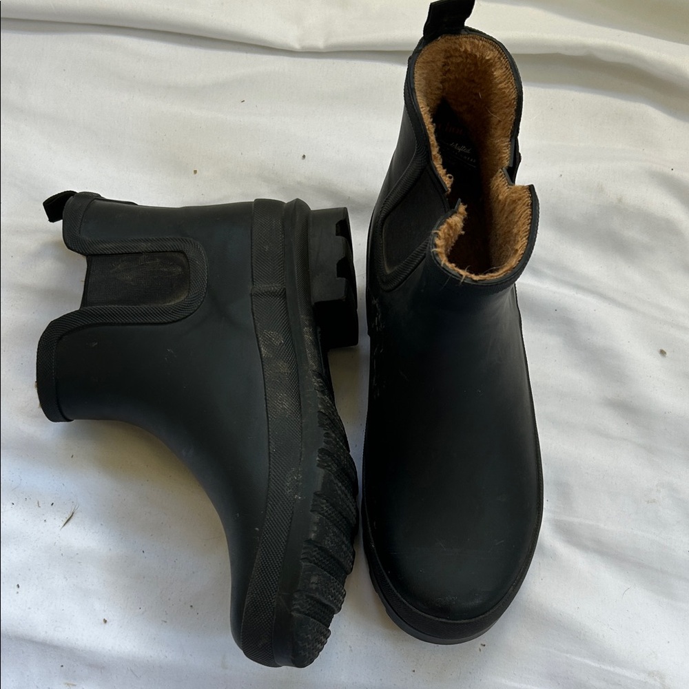 Black ankle height rain boots